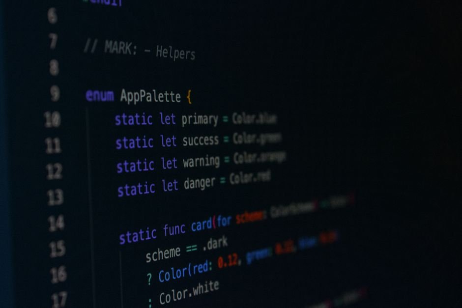 Macro photography of color palette code in a programming environment.
