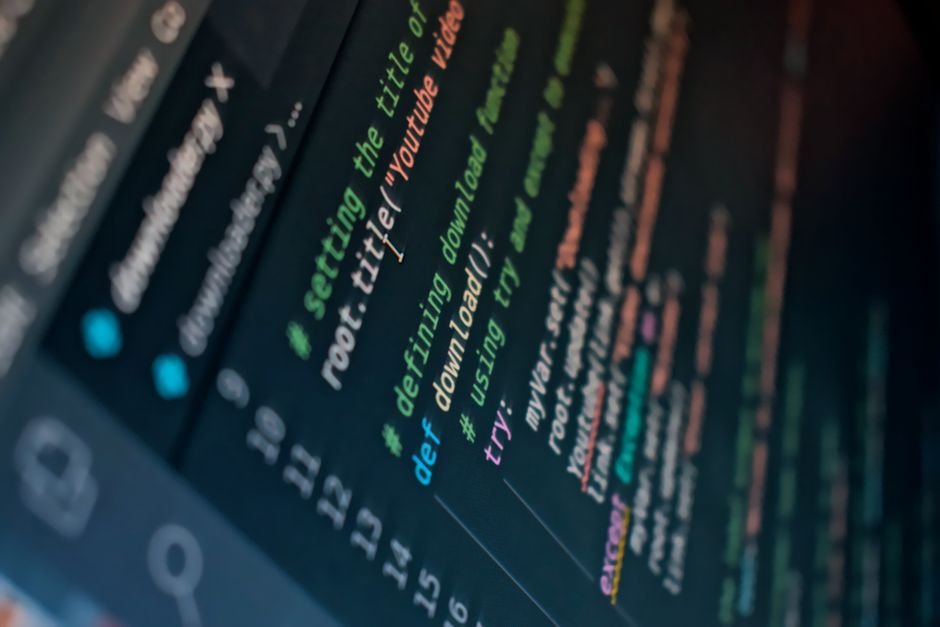 Detailed view of computer code highlighting syntax in colors on a screen.