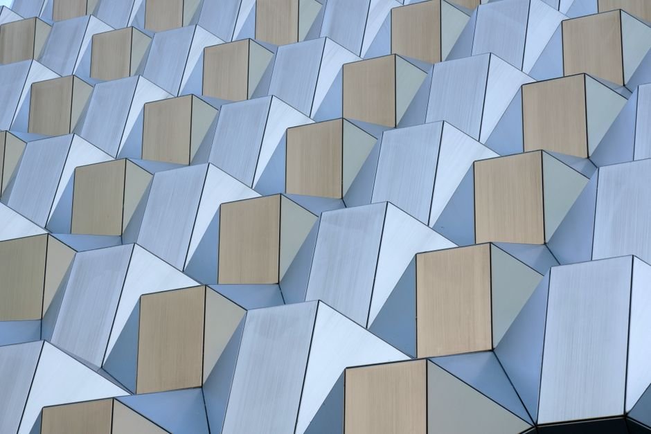 Geometric facade of a modern building in Dresden, Germany showcasing abstract architecture patterns.